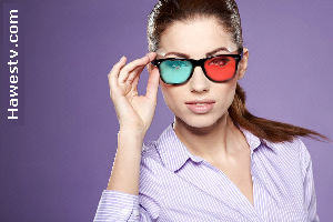 Photo: Girl wearing anaglyph glasses (red on left)